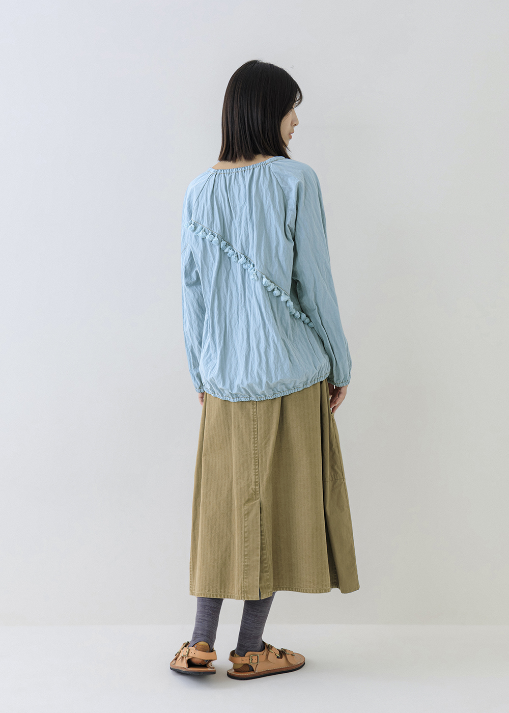 緩綴流蘇領結上衣