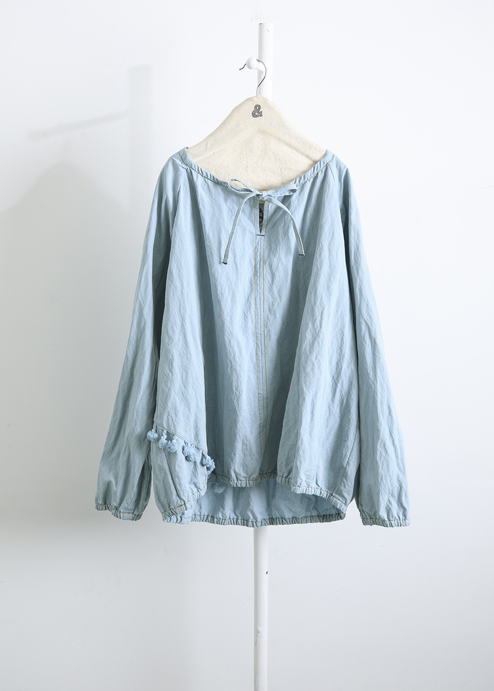 緩綴流蘇領結上衣