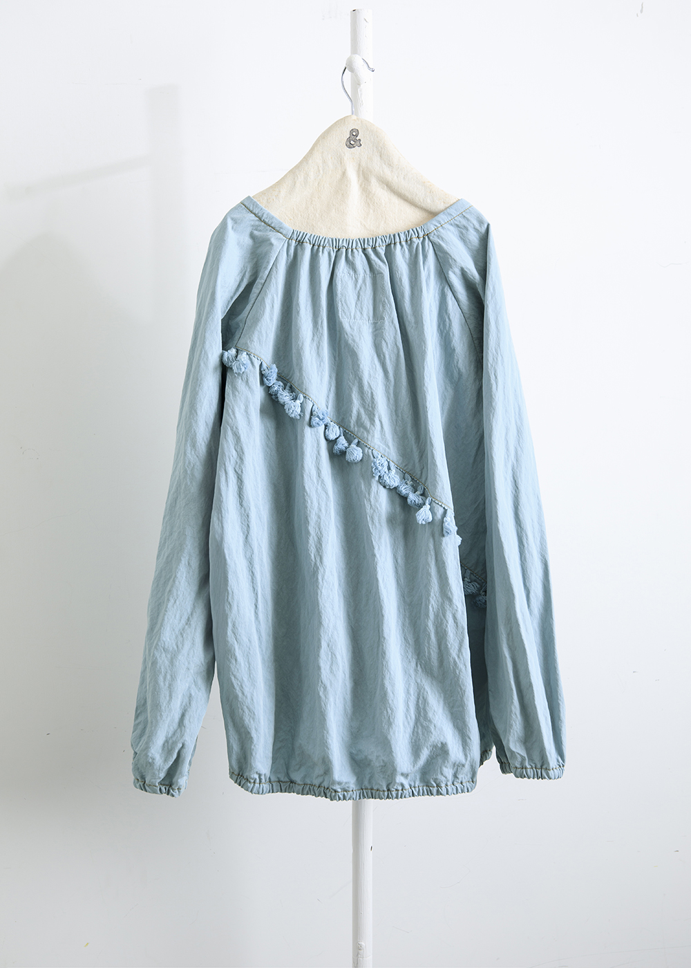 緩綴流蘇領結上衣