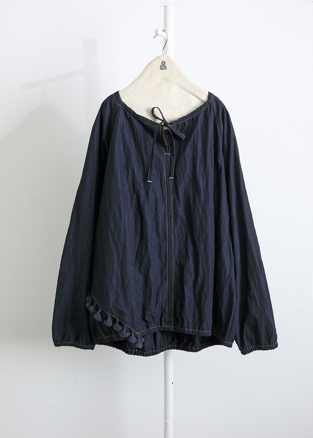 緩綴流蘇領結上衣