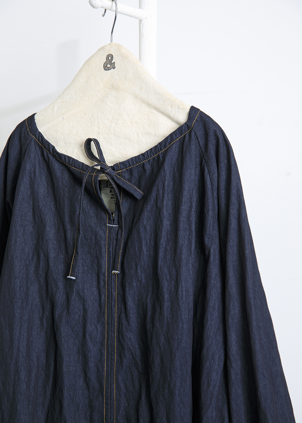 緩綴流蘇領結上衣