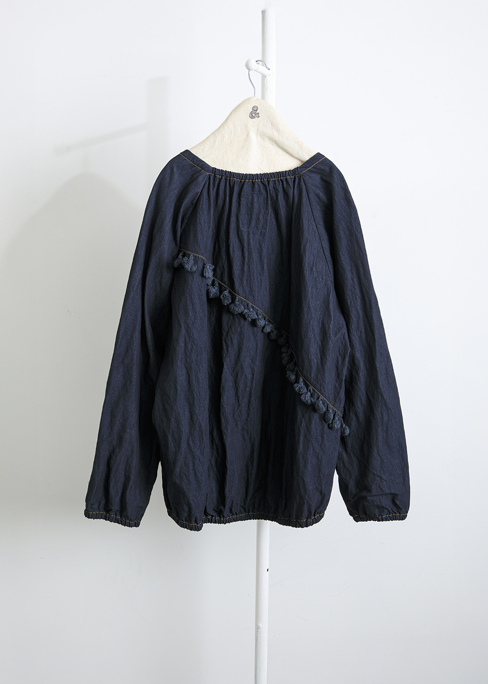 緩綴流蘇領結上衣