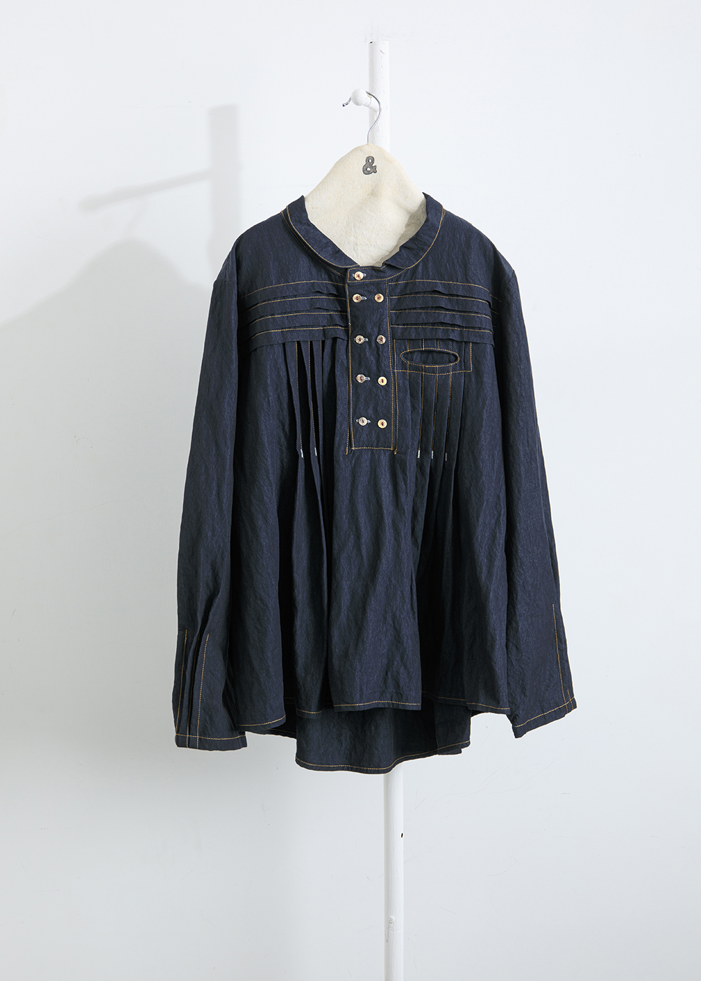 綻生層疊細縫半門襟上衣