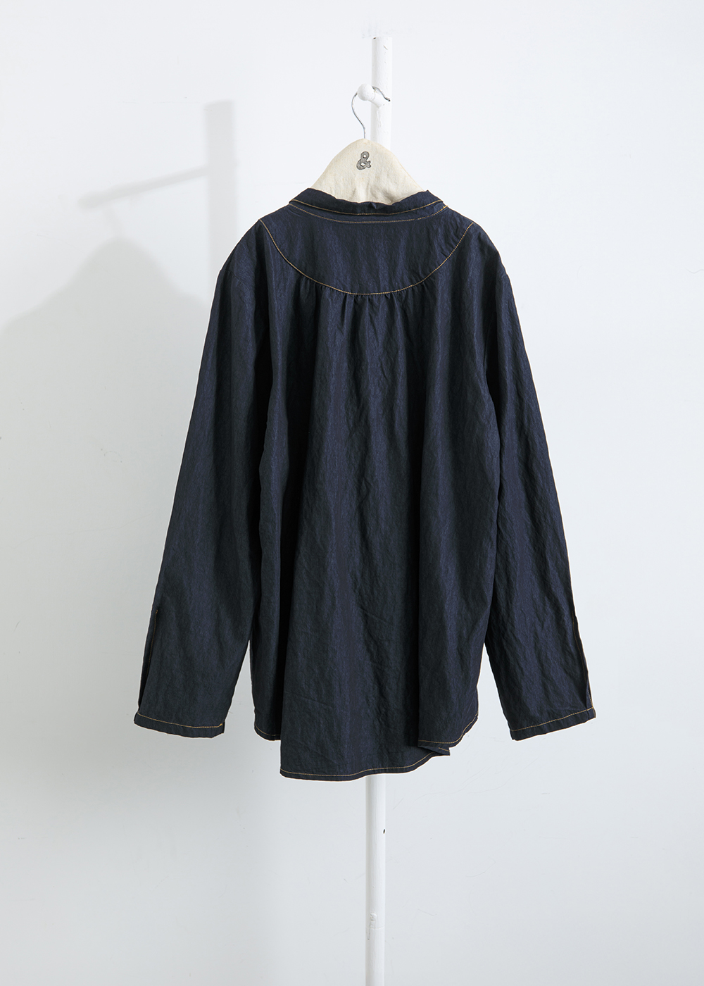 綻生層疊細縫半門襟上衣