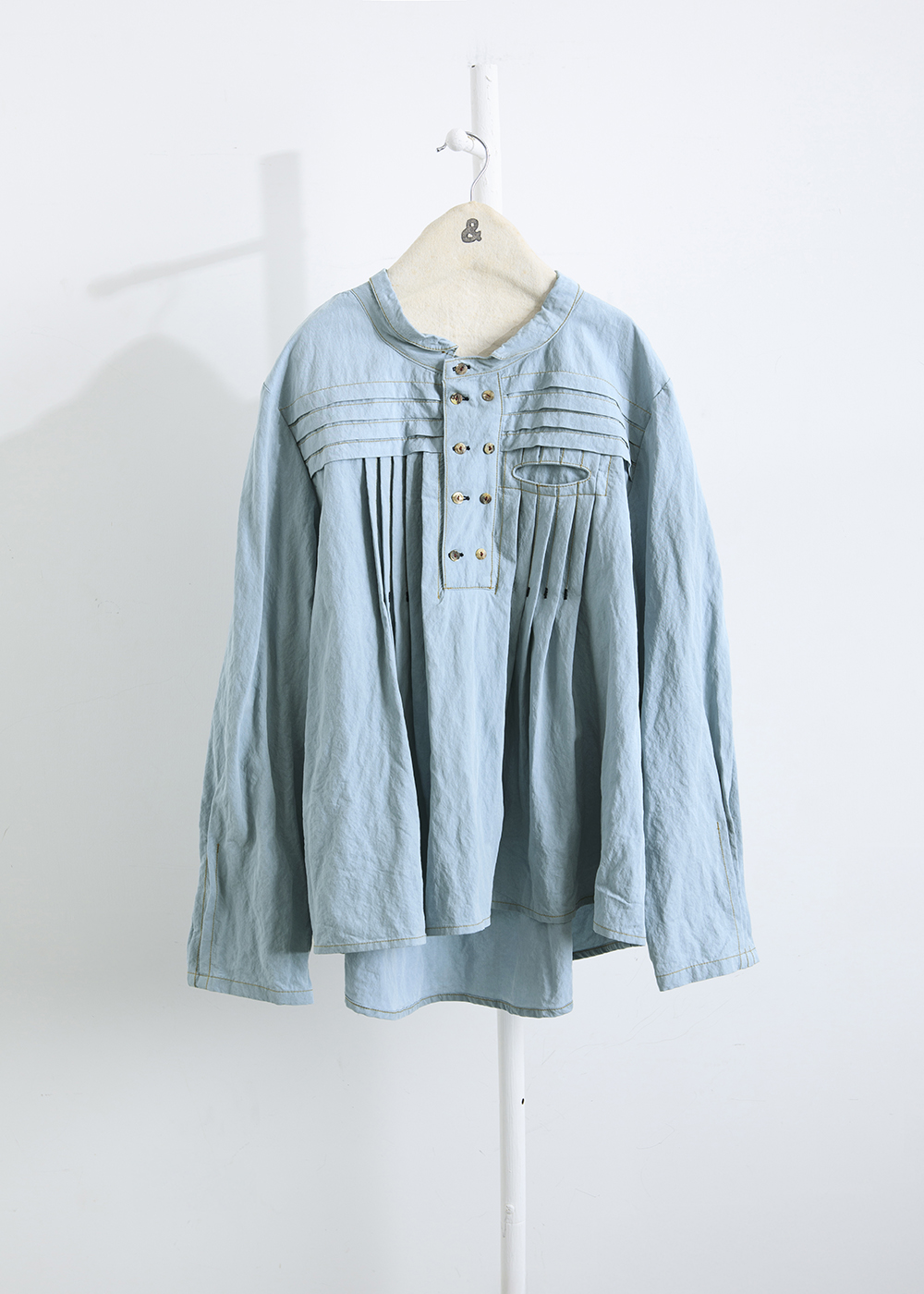 綻生層疊細縫半門襟上衣