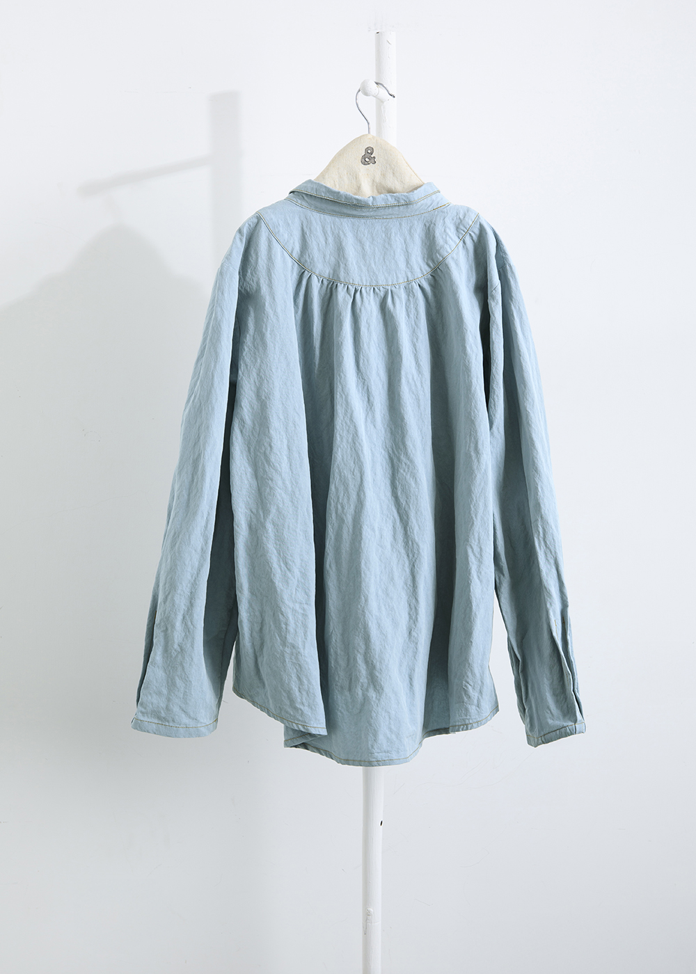 綻生層疊細縫半門襟上衣