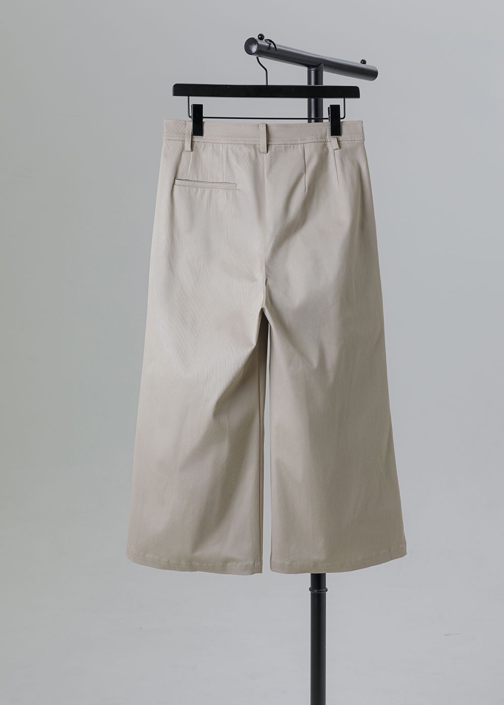 不對稱飾片開衩微寬八分長褲