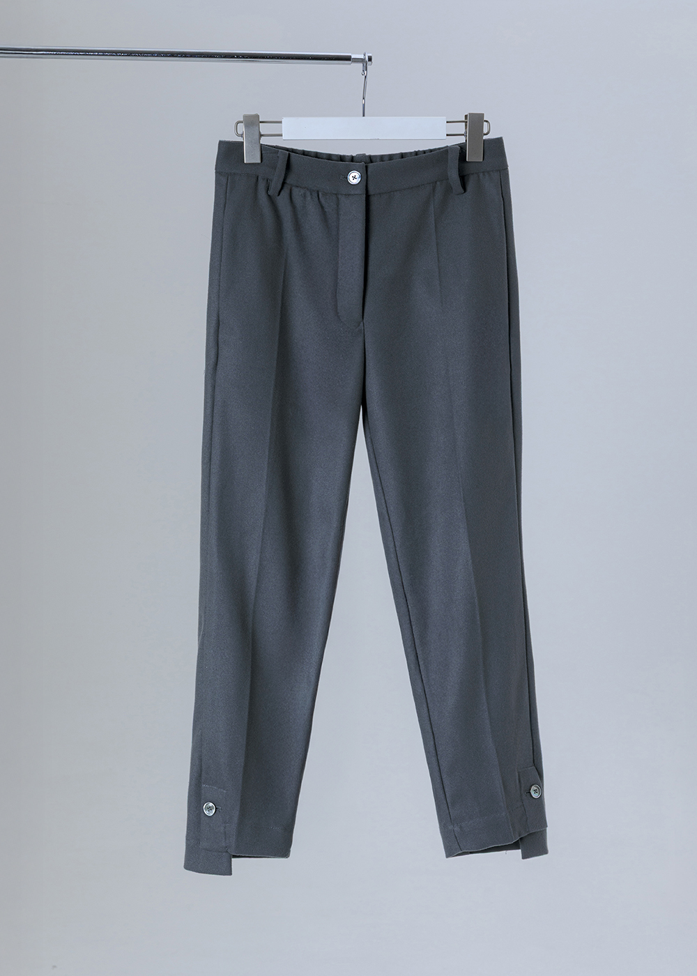 收束下擺釦飾修身長褲