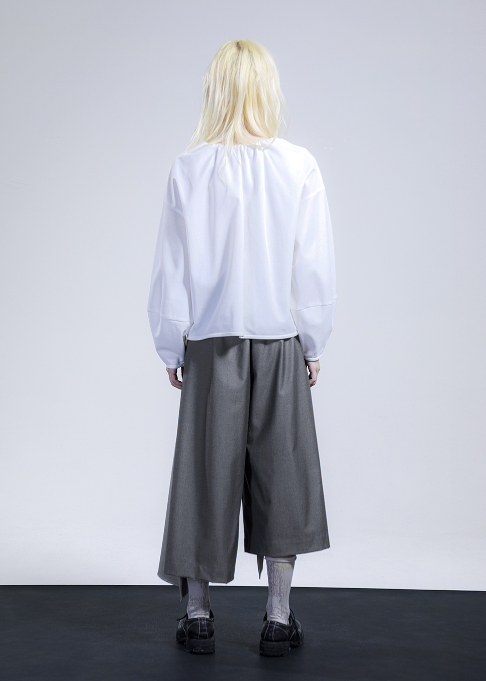 三角剪接不對稱長褲