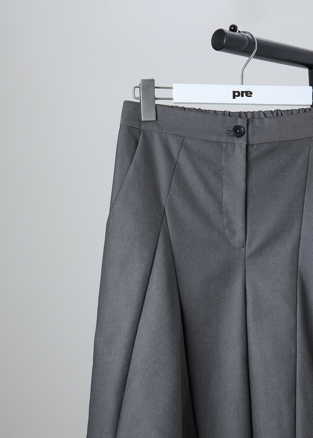 三角剪接不對稱長褲