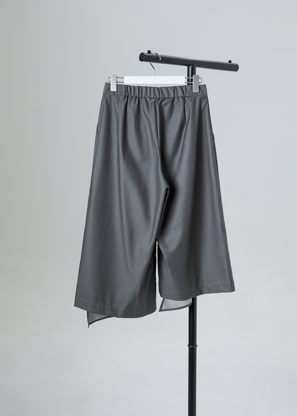 三角剪接不對稱長褲