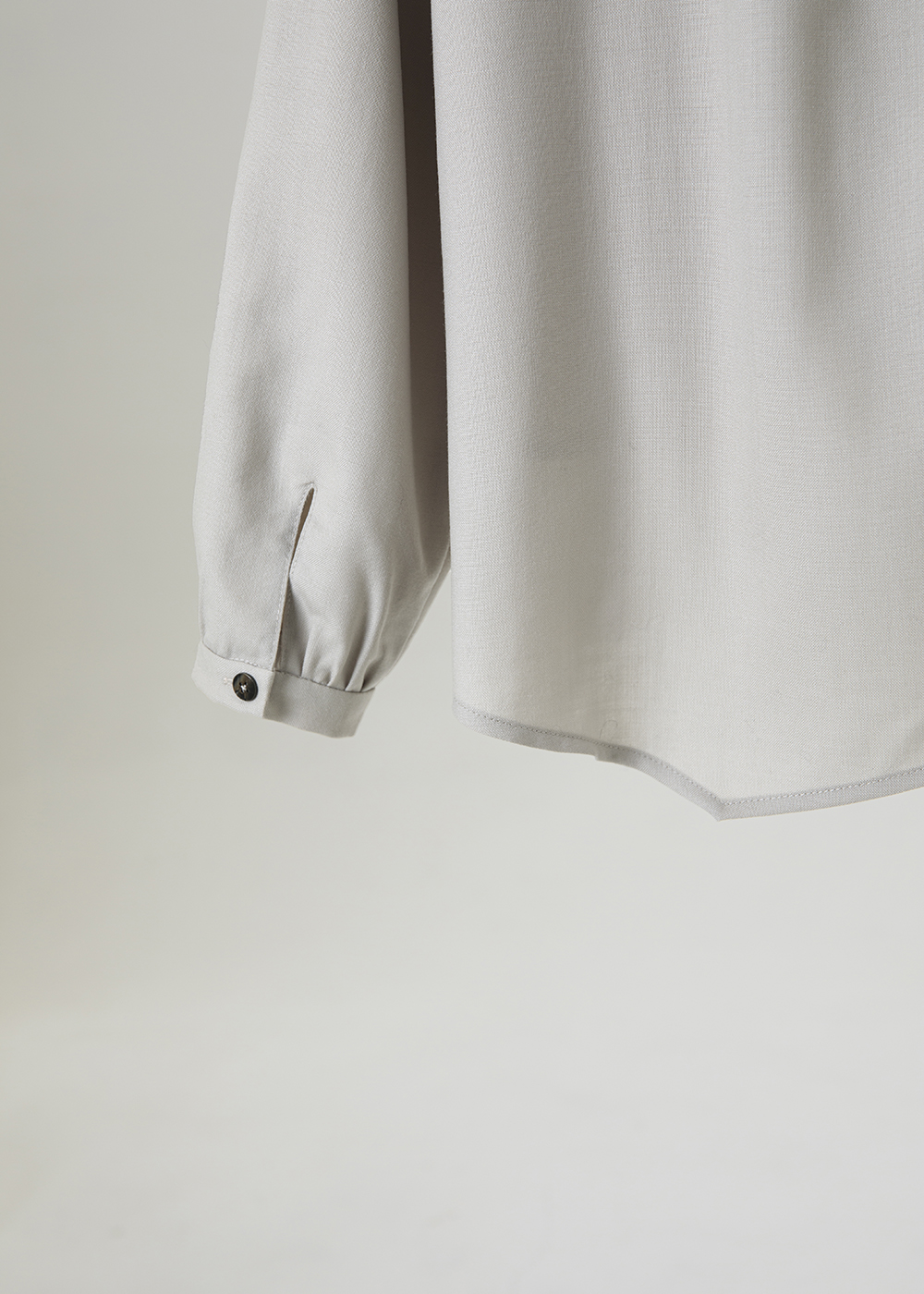 不對稱抓褶上衣