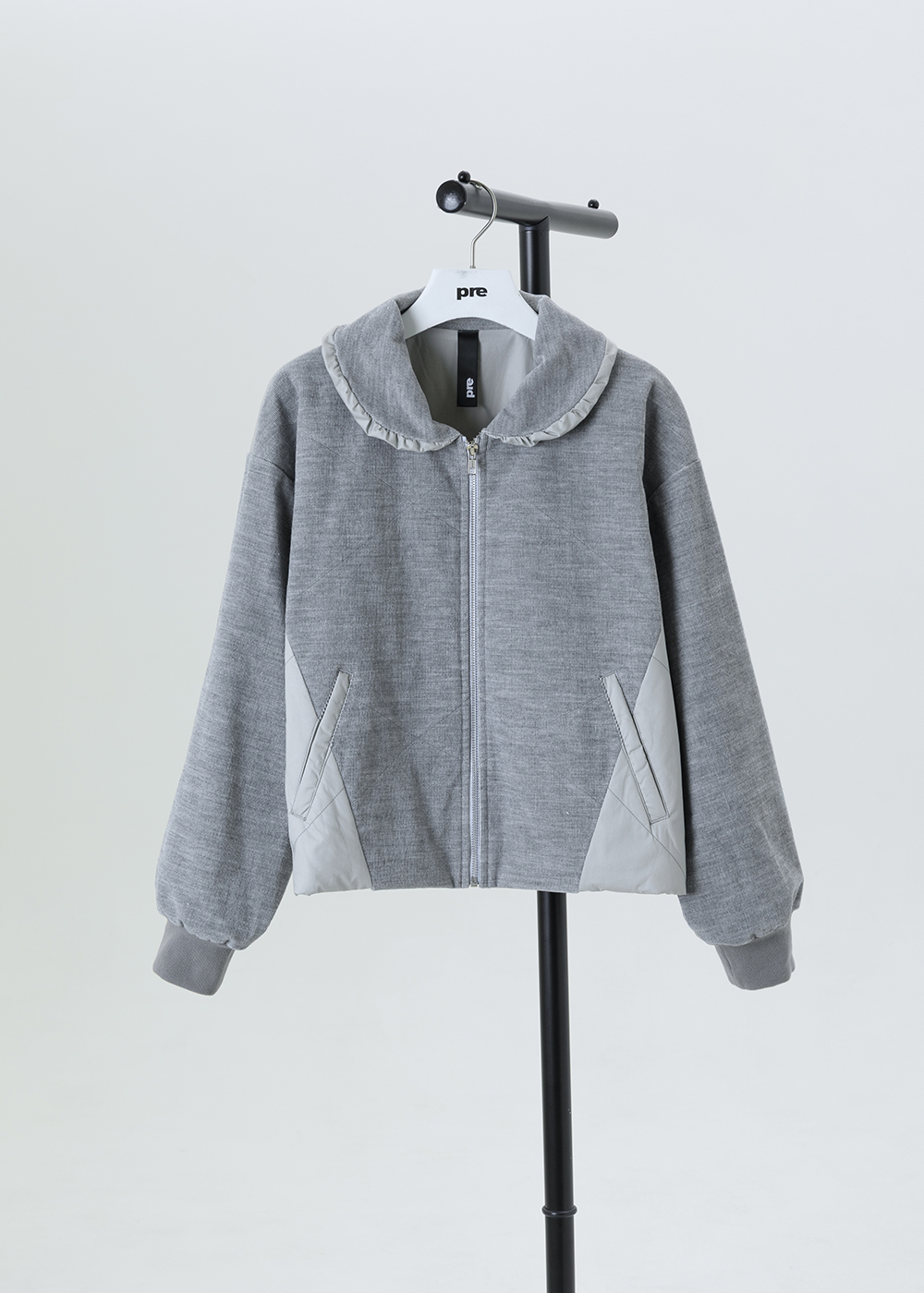 異塑弧領鋪棉外套