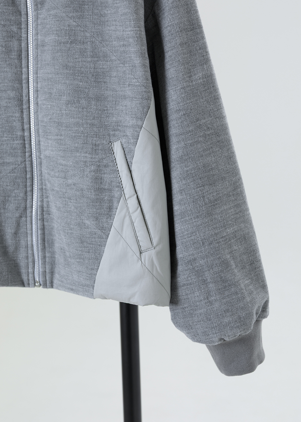 異塑弧領鋪棉外套