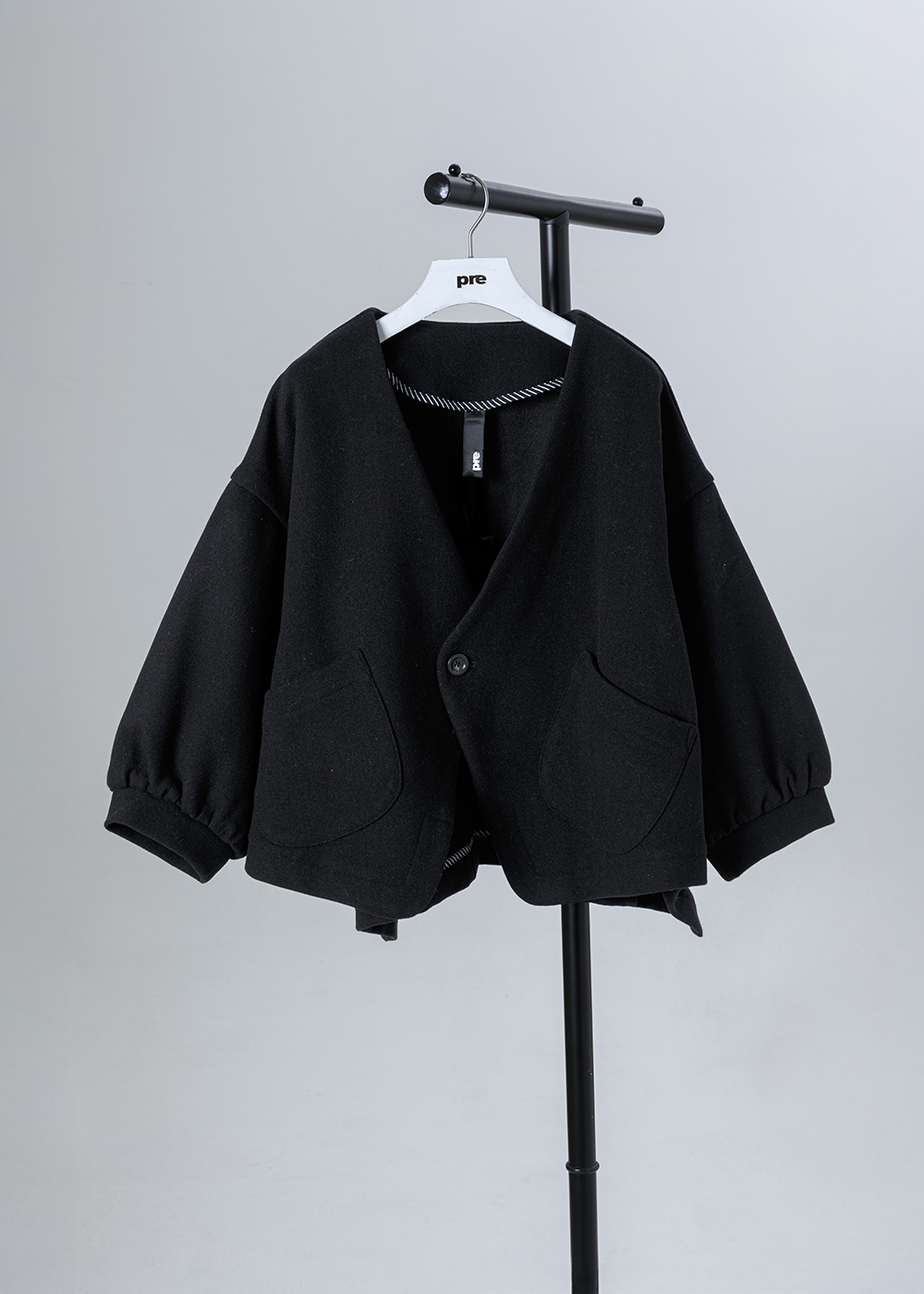 短版圓弧剪裁外套