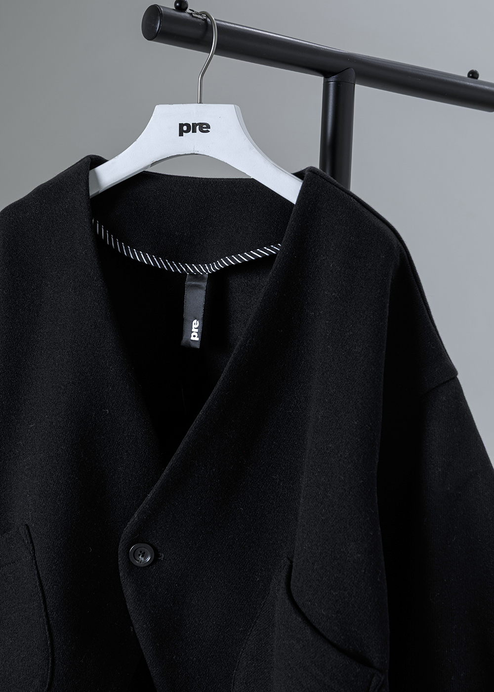 短版圓弧剪裁外套