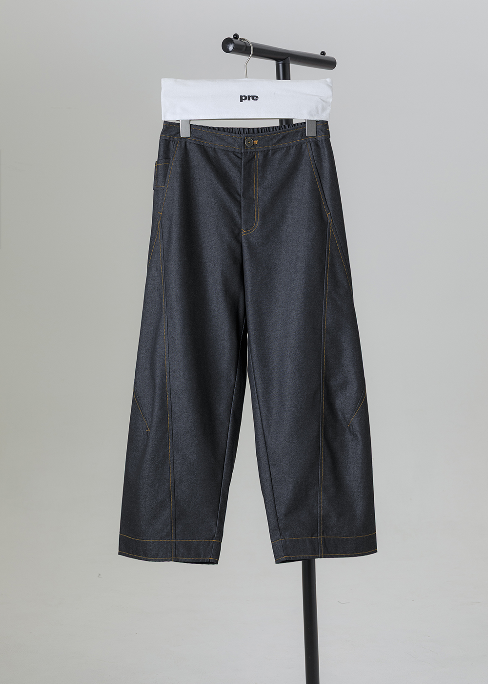 迴聲立體弧線剪接褲